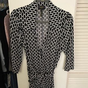 Wrap dress worn twice. Great for a wedding guest or a date night.